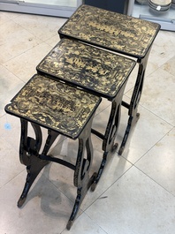 A set of three Chinese Canton gilt-lacquered nesting tables with narrative design, 19th C.
