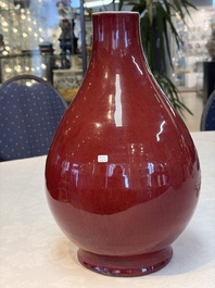 A Chinese flamb&eacute;-glazed vase and a jar with wooden cover, 19th C.