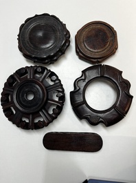 A collection of 25 Chinese wooden stands, 19/20th C.