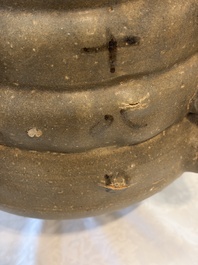 A large inscribed Chinese spiked funerary jar and cover, Northern Song, dated 1026