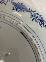 A massive Japanese blue and white 'Dragon among Sea Waves' dish, probably Arita, Meiji, 19th C.