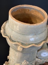 A large Chinese qingbai covered urn applied with immortals and a dragon, Northern Song