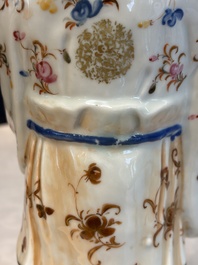A Chinese famille rose candle holder in the shape of a court lady holding a 'Gu' vase, Qianlong