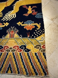 A Sino-Tibetan inscribed woollen 'Dragon' pillar carpet, 19th C.