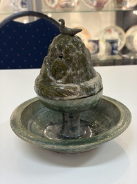 A Chinese green-glazed pottery 'Boshanlu' stemmed censer and cover, Han