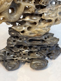 A fine Chinese carved soapstone 'Dragons among Clouds' group and a 'Phoenixes and Cranes' group, 20th C.
