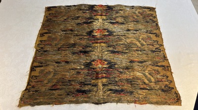 Two Chinese yellow-ground kesi silk 'Dragon' panels, late Ming