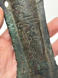 A Chinese archaic bronze fitting and a spearhead, Western Zhou