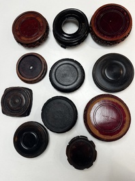 A collection of 111 Chinese wooden stands, 19/20th C.