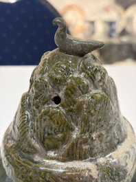 A Chinese green-glazed pottery 'Boshanlu' stemmed censer and cover, Han