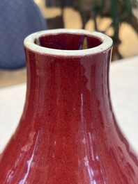 A Chinese flamb&eacute;-glazed vase and a jar with wooden cover, 19th C.