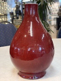 A Chinese flamb&eacute;-glazed vase and a jar with wooden cover, 19th C.
