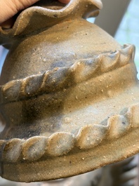 A large inscribed Chinese spiked funerary jar and cover, Northern Song, dated 1026