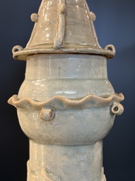 A large Chinese qingbai covered urn applied with immortals and a dragon, Northern Song