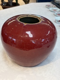 A Chinese flamb&eacute;-glazed vase and a jar with wooden cover, 19th C.
