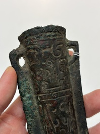 A Chinese archaic bronze fitting and a spearhead, Western Zhou