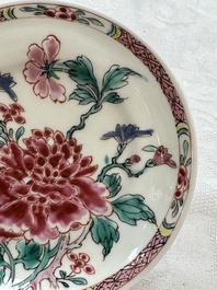 Four Chinese famille rose cups and saucers, Yongzheng/Qianlong