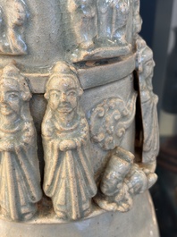 A large Chinese qingbai covered urn applied with immortals and a dragon, Northern Song