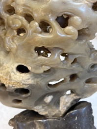 A fine Chinese carved soapstone 'Dragons among Clouds' group and a 'Phoenixes and Cranes' group, 20th C.