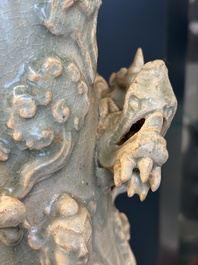 A large Chinese qingbai covered urn applied with immortals and a dragon, Northern Song