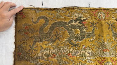 Two Chinese yellow-ground kesi silk 'Dragon' panels, late Ming