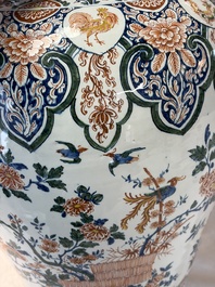 A large Dutch Delft cashmere palette vase with a phoenix and birds among flowers, ca. 1700