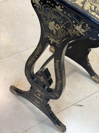 A set of three Chinese Canton gilt-lacquered nesting tables with narrative design, 19th C.