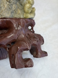 A fine Chinese carved soapstone 'Squirrels and Grapes' group and a 'Phoenixes among Peonies' group, 20th C.