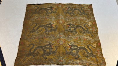 Two Chinese yellow-ground kesi silk 'Dragon' panels, late Ming