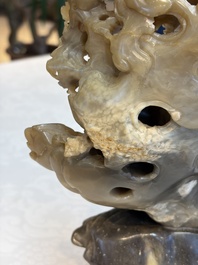 A fine Chinese carved soapstone 'Dragons among Clouds' group and a 'Phoenixes and Cranes' group, 20th C.
