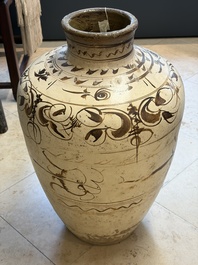 A large Chinese Cizhou ware slip-glazed wine jar, Ming