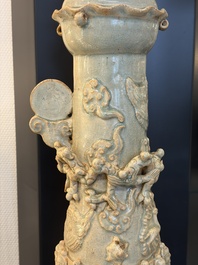 A large Chinese qingbai covered urn applied with immortals and a dragon, Northern Song