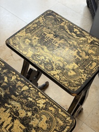A set of three Chinese Canton gilt-lacquered nesting tables with narrative design, 19th C.