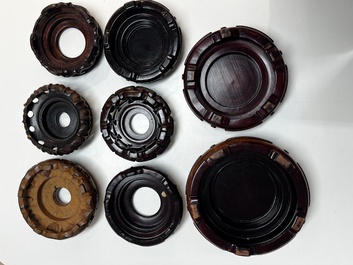 A collection of 20 Chinese wooden stands, 19/20th C.