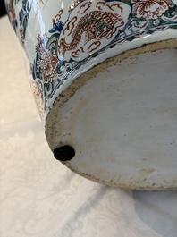 A large Dutch Delft cashmere palette vase with a phoenix and birds among flowers, ca. 1700