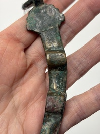 A Chinese archaic bronze fitting and a spearhead, Western Zhou