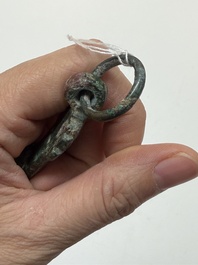 A Chinese archaic bronze fitting and a spearhead, Western Zhou