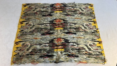 Two Chinese yellow-ground kesi silk 'Dragon' panels, late Ming