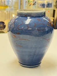 A rare pair of Japanese gilt-decorated blue-ground vases, Edo, late 17th C.