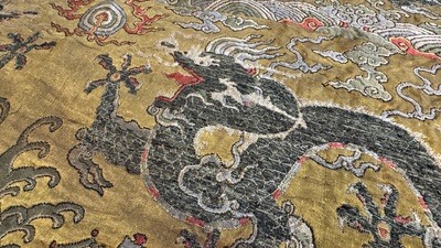 Two Chinese yellow-ground kesi silk 'Dragon' panels, late Ming