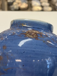 A rare pair of Japanese gilt-decorated blue-ground vases, Edo, late 17th C.