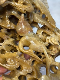 A fine Chinese carved soapstone 'Dragons among Clouds' group and a 'Phoenixes and Cranes' group, 20th C.