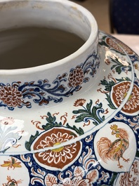 A large Dutch Delft cashmere palette vase with a phoenix and birds among flowers, ca. 1700