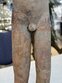 A Chinese cold-painted pottery stick man figure, Han