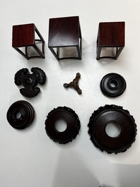 A collection of 25 Chinese wooden stands, 19/20th C.