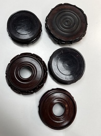 A collection of 20 Chinese wooden stands, 19/20th C.