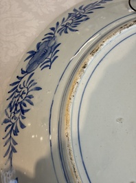 A massive Japanese blue and white 'Dragon among Sea Waves' dish, probably Arita, Meiji, 19th C.