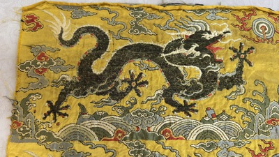 Two Chinese yellow-ground kesi silk 'Dragon' panels, late Ming