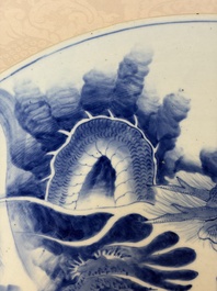A massive Japanese blue and white 'Dragon among Sea Waves' dish, probably Arita, Meiji, 19th C.