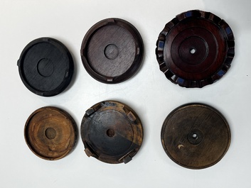 A collection of 75 Chinese wooden stands, 19/20th C.